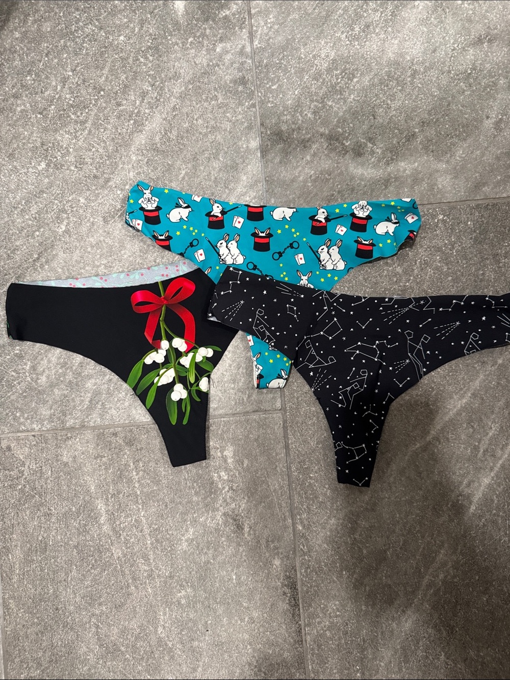 Three-Pack Women's Printed Bikini Bottoms in Teal, Black, and Black
